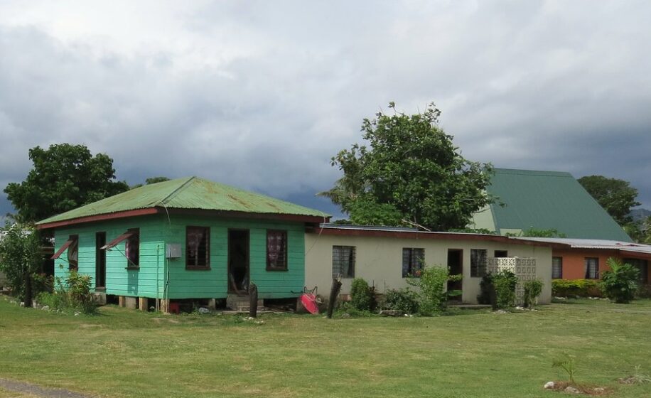 "Fiji: Viseisei Village Homes" by Larry Myhre is licensed under CC BY-NC-SA 2.0. To view a copy of this license, visit https://creativecommons.org/licenses/by-nc-sa/2.0/